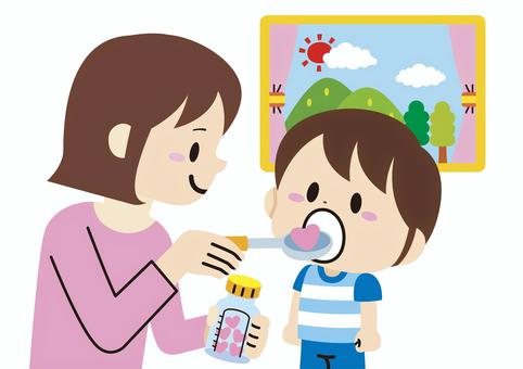 お薬を飲む子供
