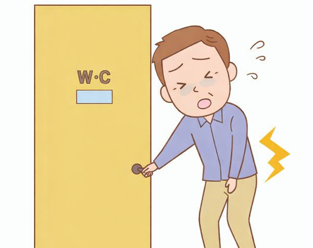トイレに行く男性